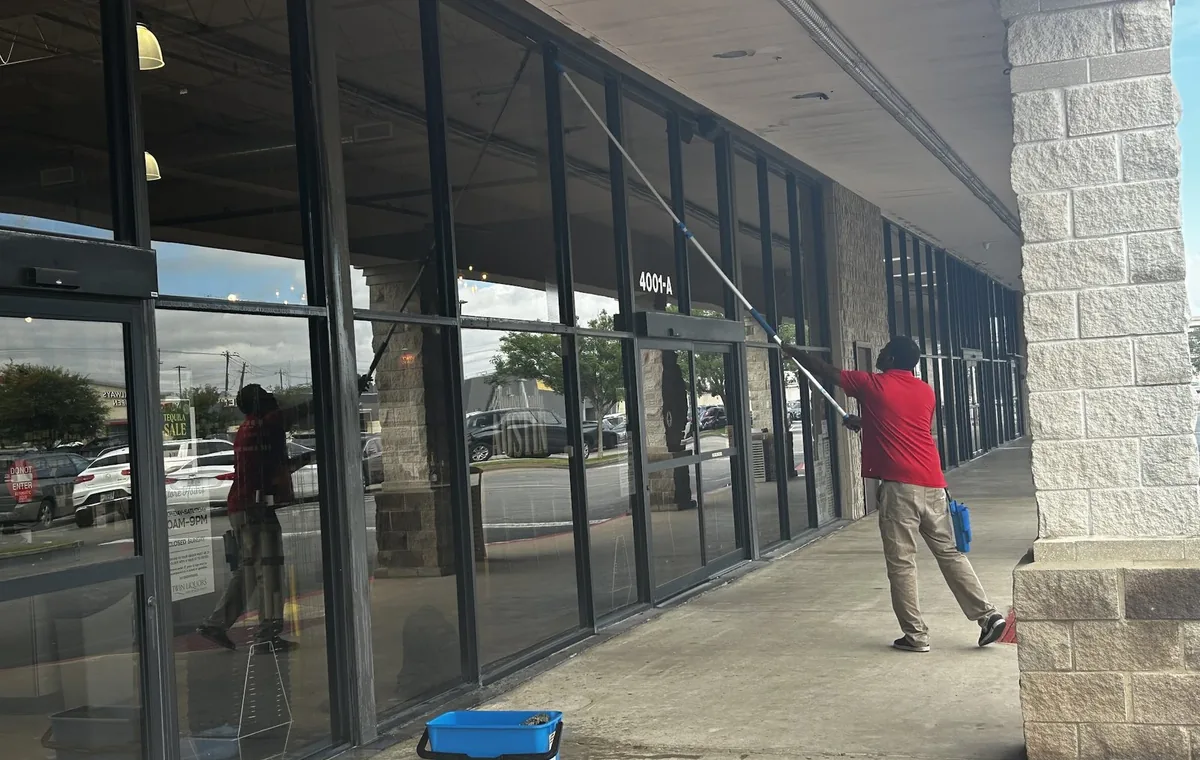Pure water window cleaning and glass detailing for Buda homes and storefronts
