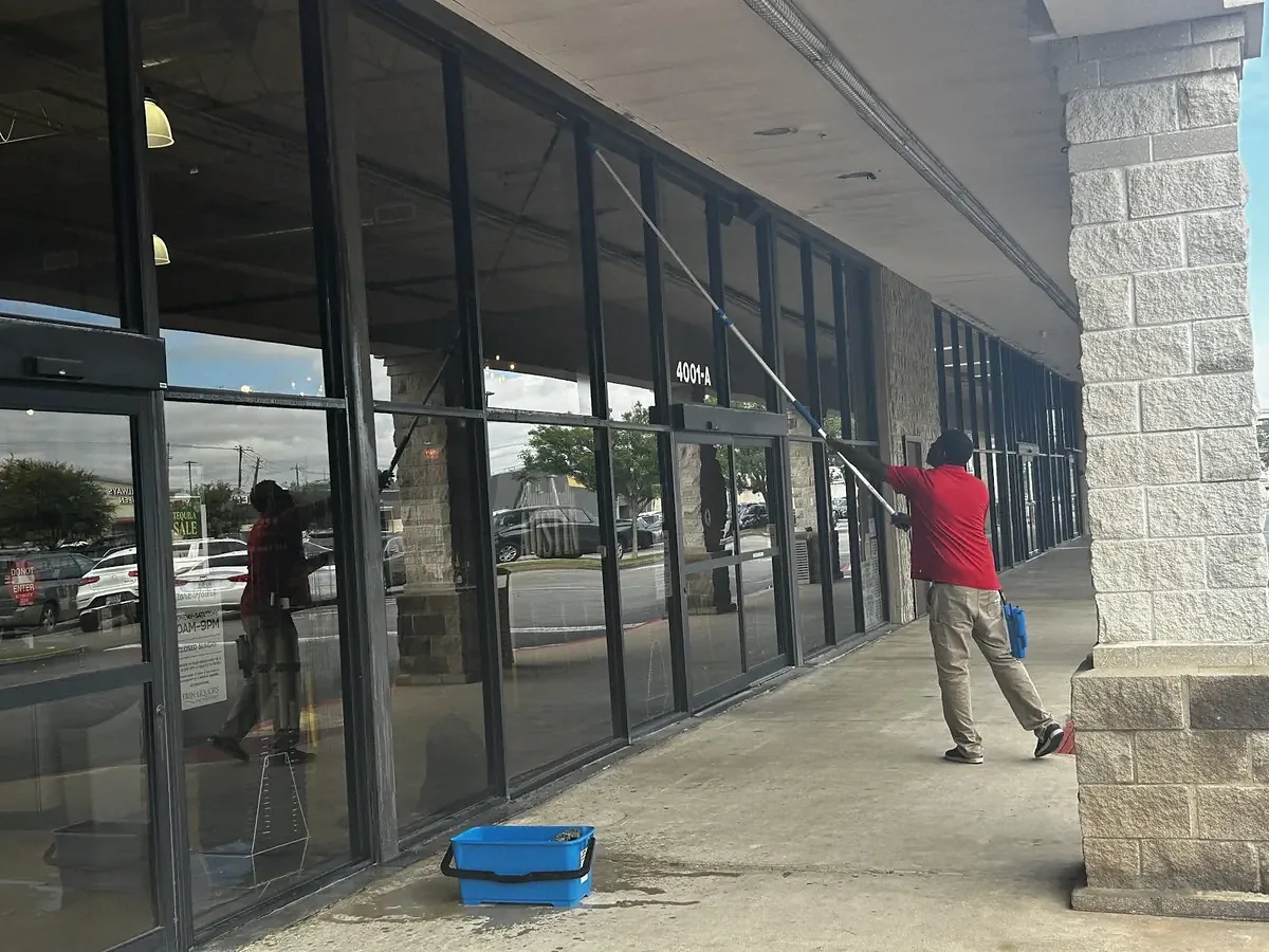 Storefront route window cleaning company Round Rock TX streak free glass