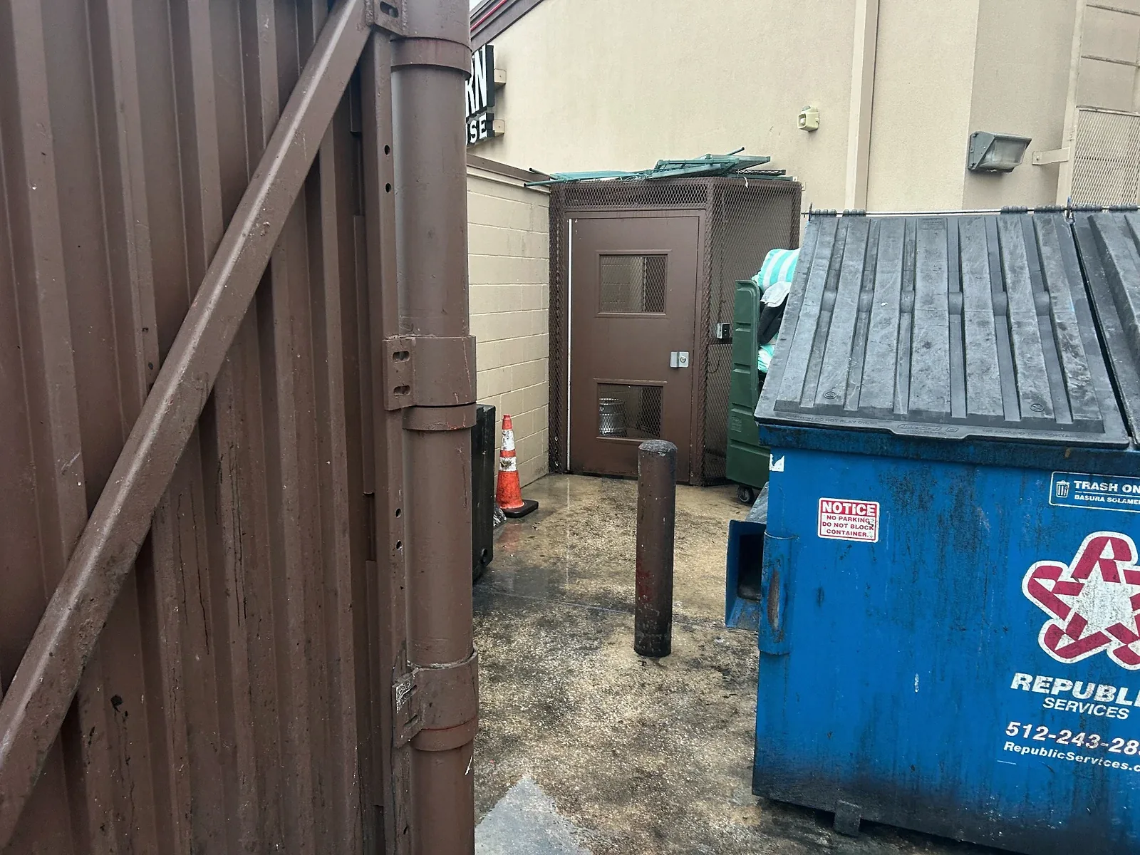 Before photo of dirty commercial dumpster pad with grease and grime in Austin TX