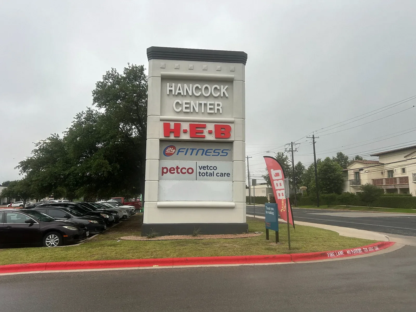 Before photo of dirty Hancock Center monument sign in Austin TX before commercial pressure washing